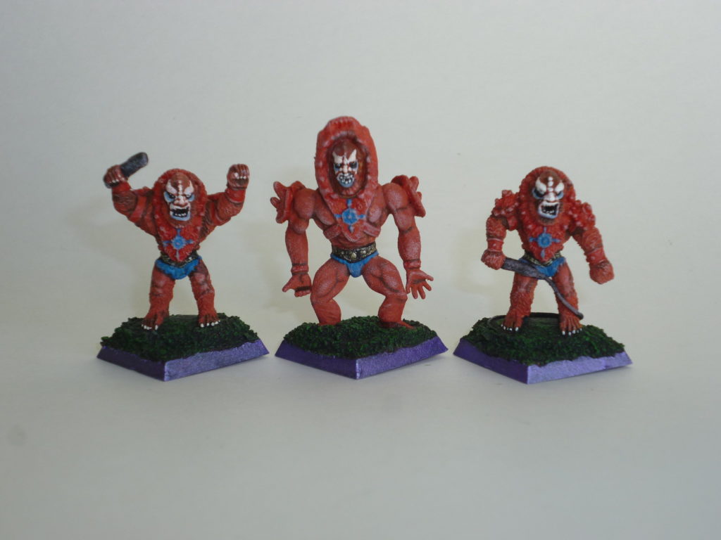 Three Beast Man toy figures