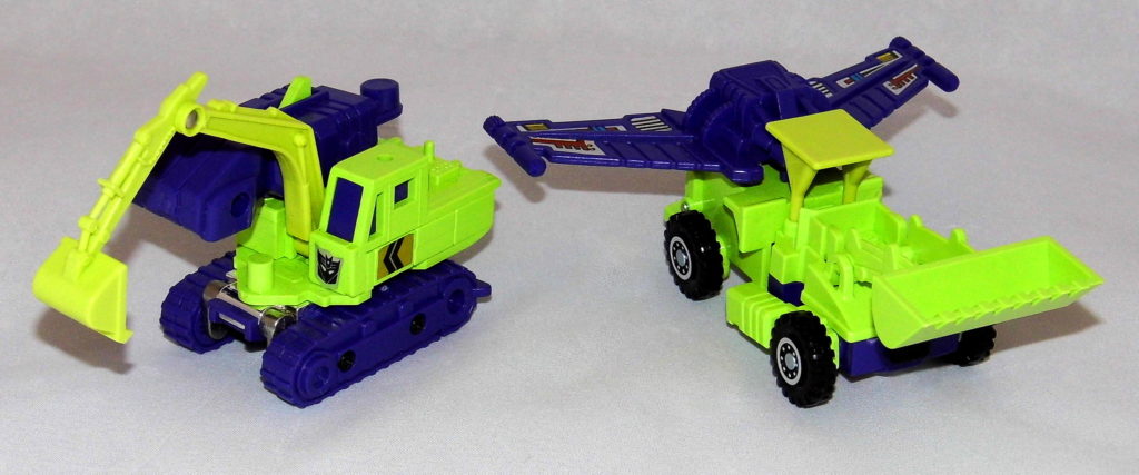 Construction vehicles Scavenger (Left) and Scrapper (Right)