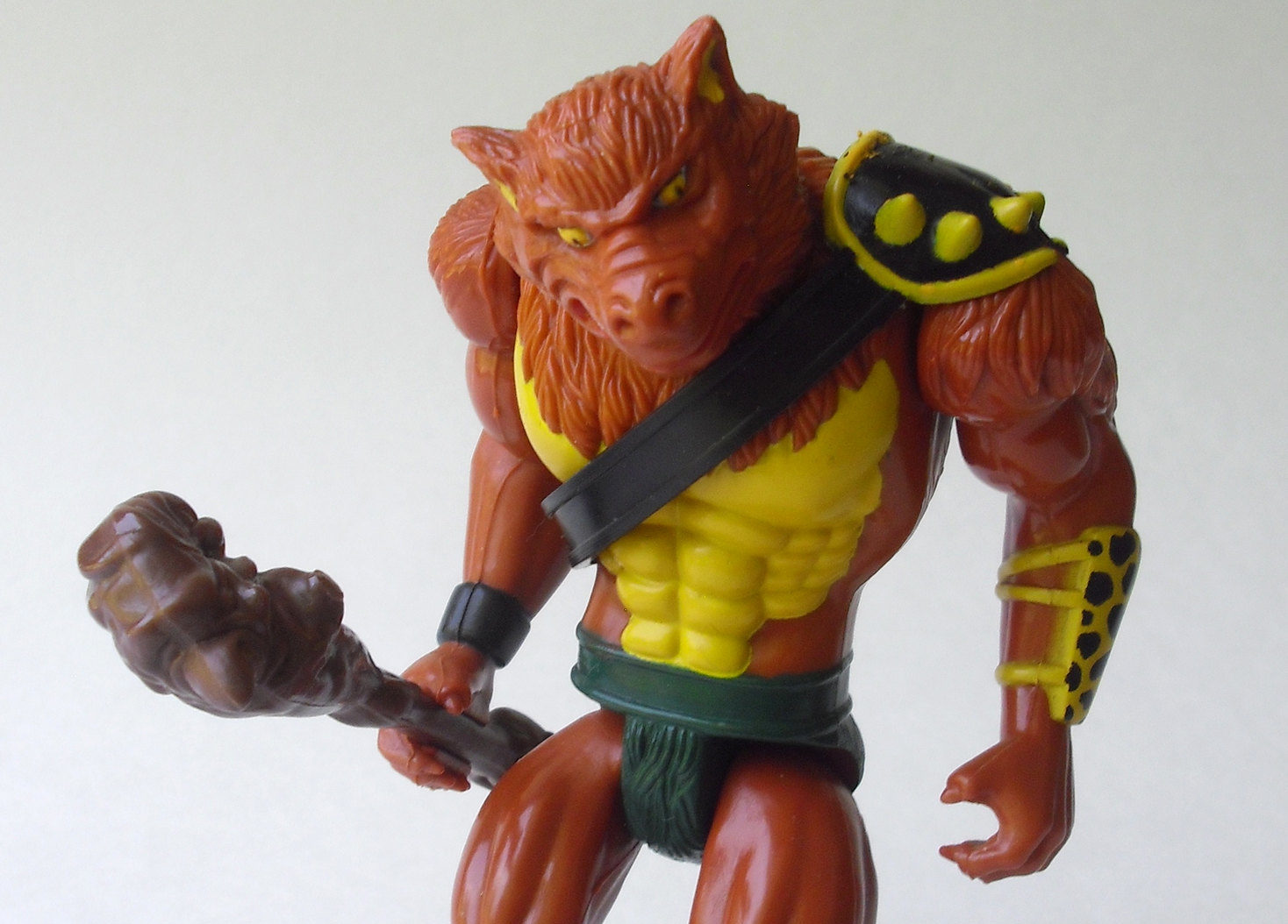 jackalman action figure with a club