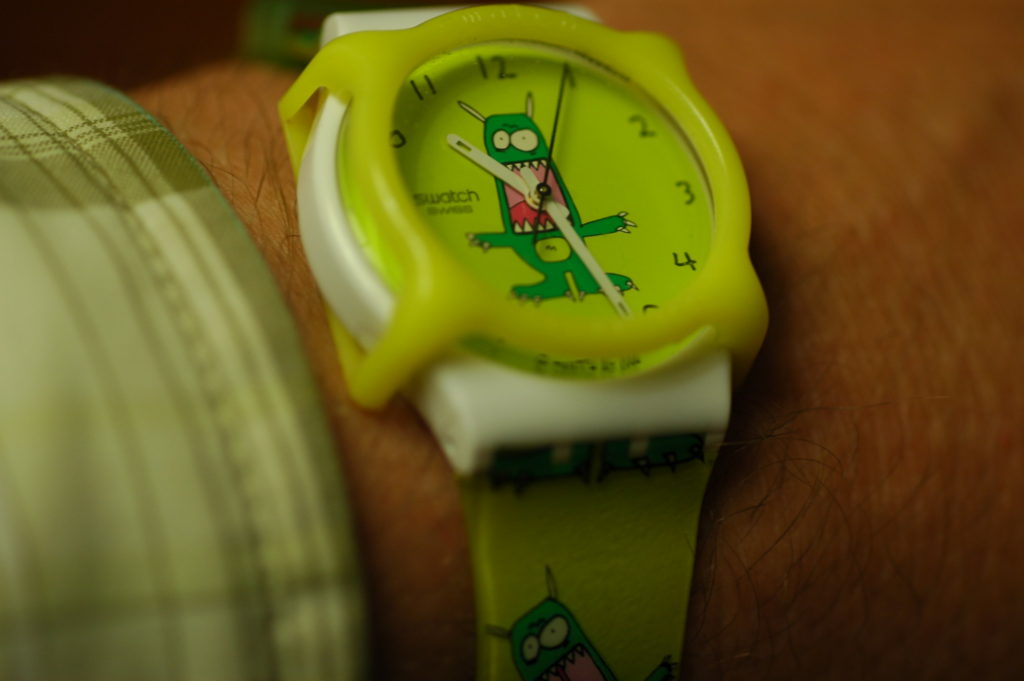 Yellow Swatch Watch with a monster