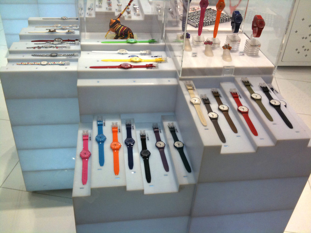 Bunch of Swatch's on display in a store