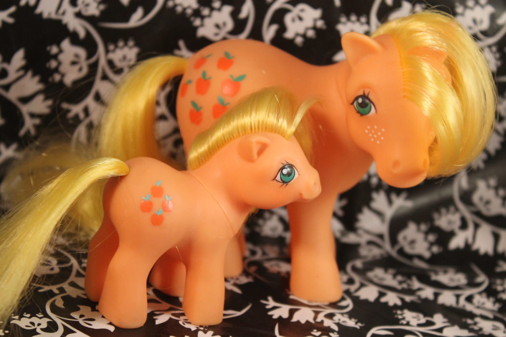 One big and one small Applejack in an orange body with blonde hair
