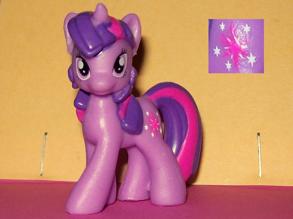 Little Pony Twilight Sparkle in purple body and blunt bangs with a magenta six-pointed star