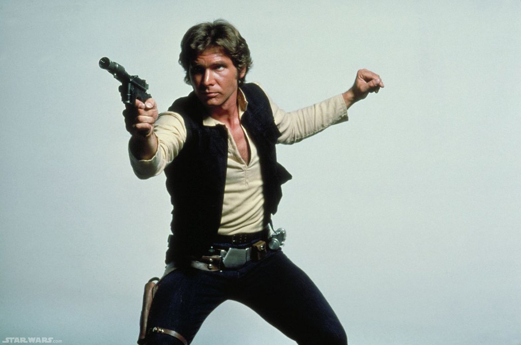 Han Solo holds a gun