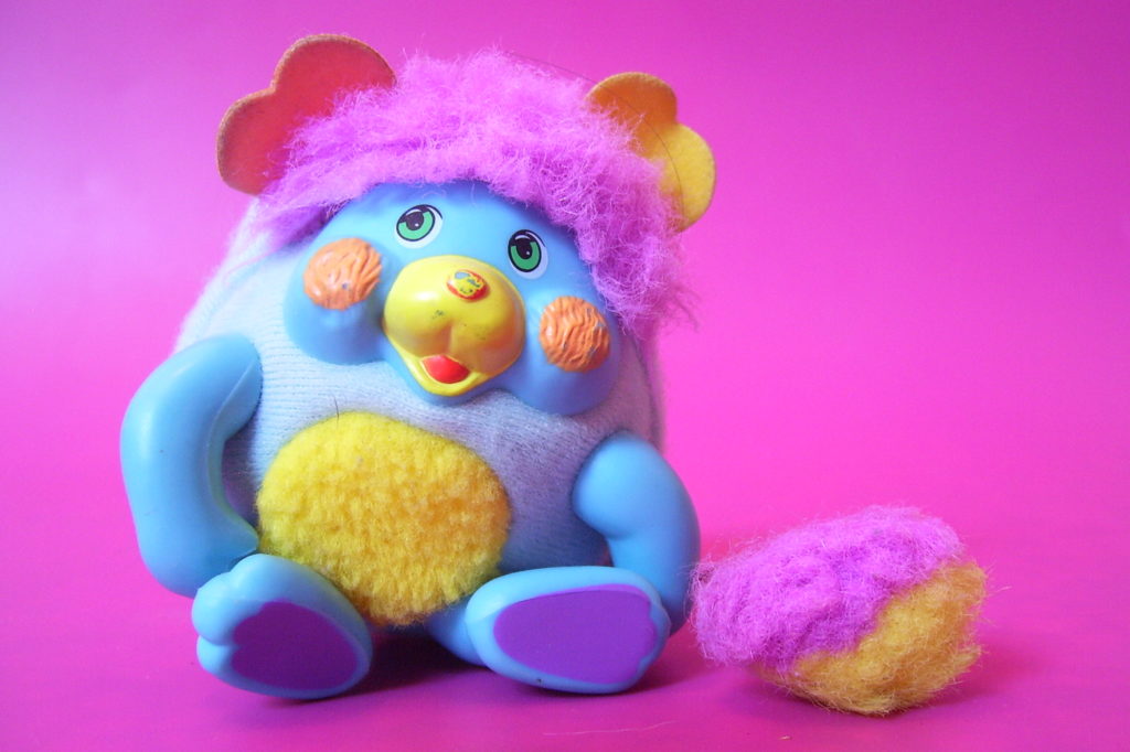 Popples on a pink background