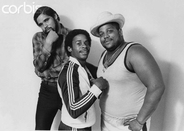 three men posing for a photo