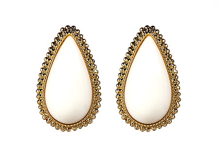 A pair of doorknocker earrings