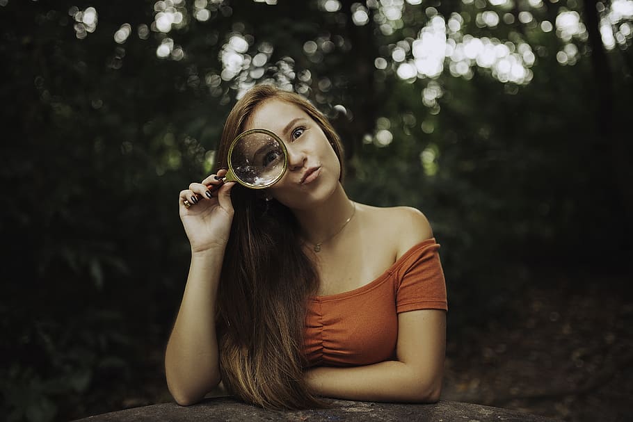 A woman wearing an off-shoulder blouse