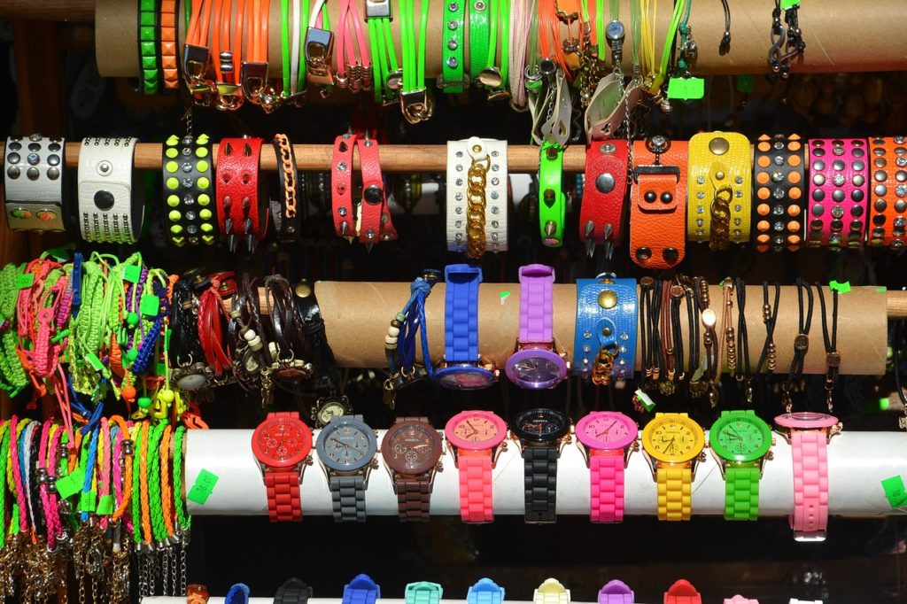 A display of colorful watches of different types