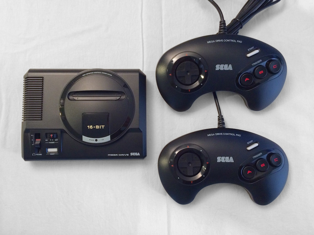 Sega Genesis Mini console and two controllers