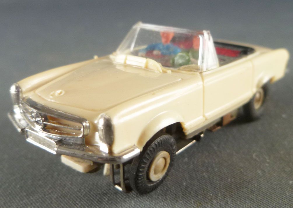 Mercedes Benz 230 SL cream colored