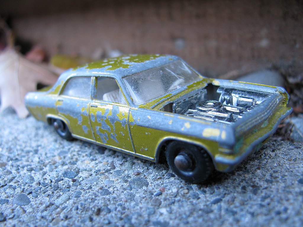 Opel Diplomat matchbox with faded paint