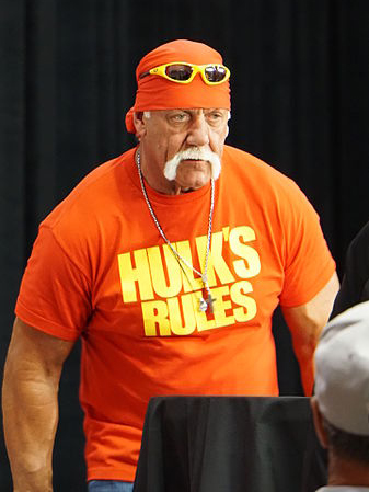 bearded man wearing Hulk Hogan's orange outfit