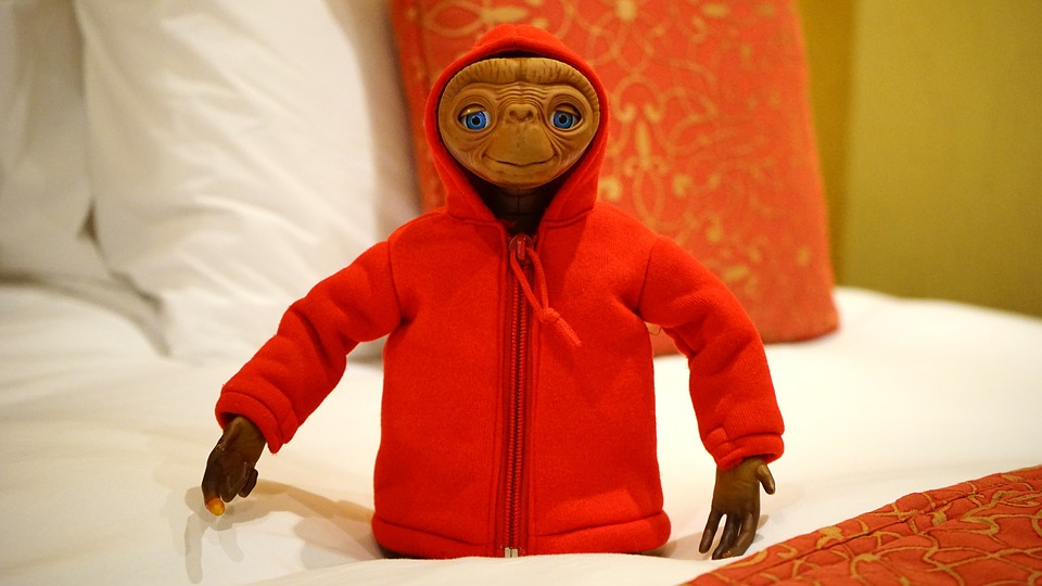 E.T. character wearing an orange hoodie